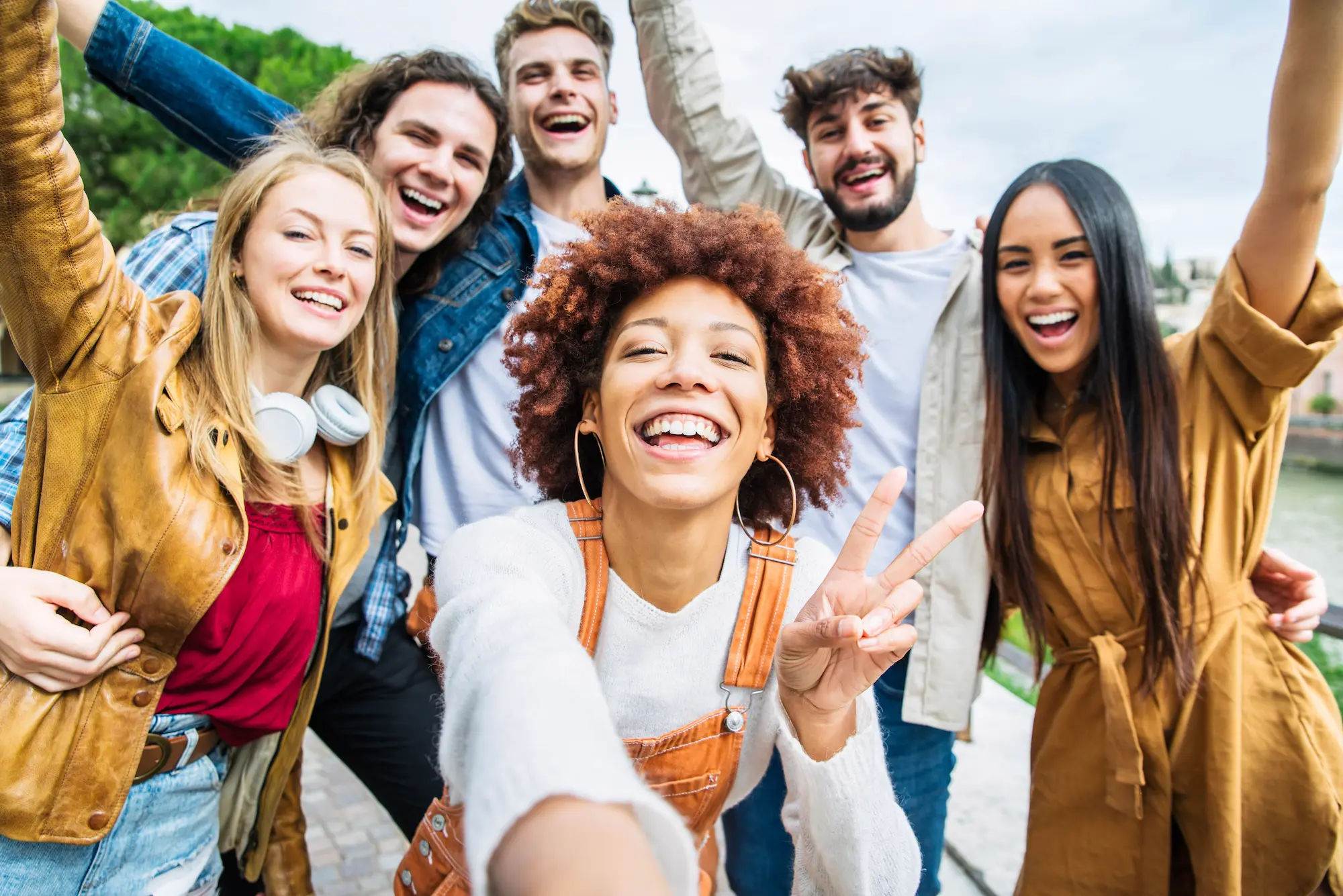 A group of friends taking a photo on their luxury trip