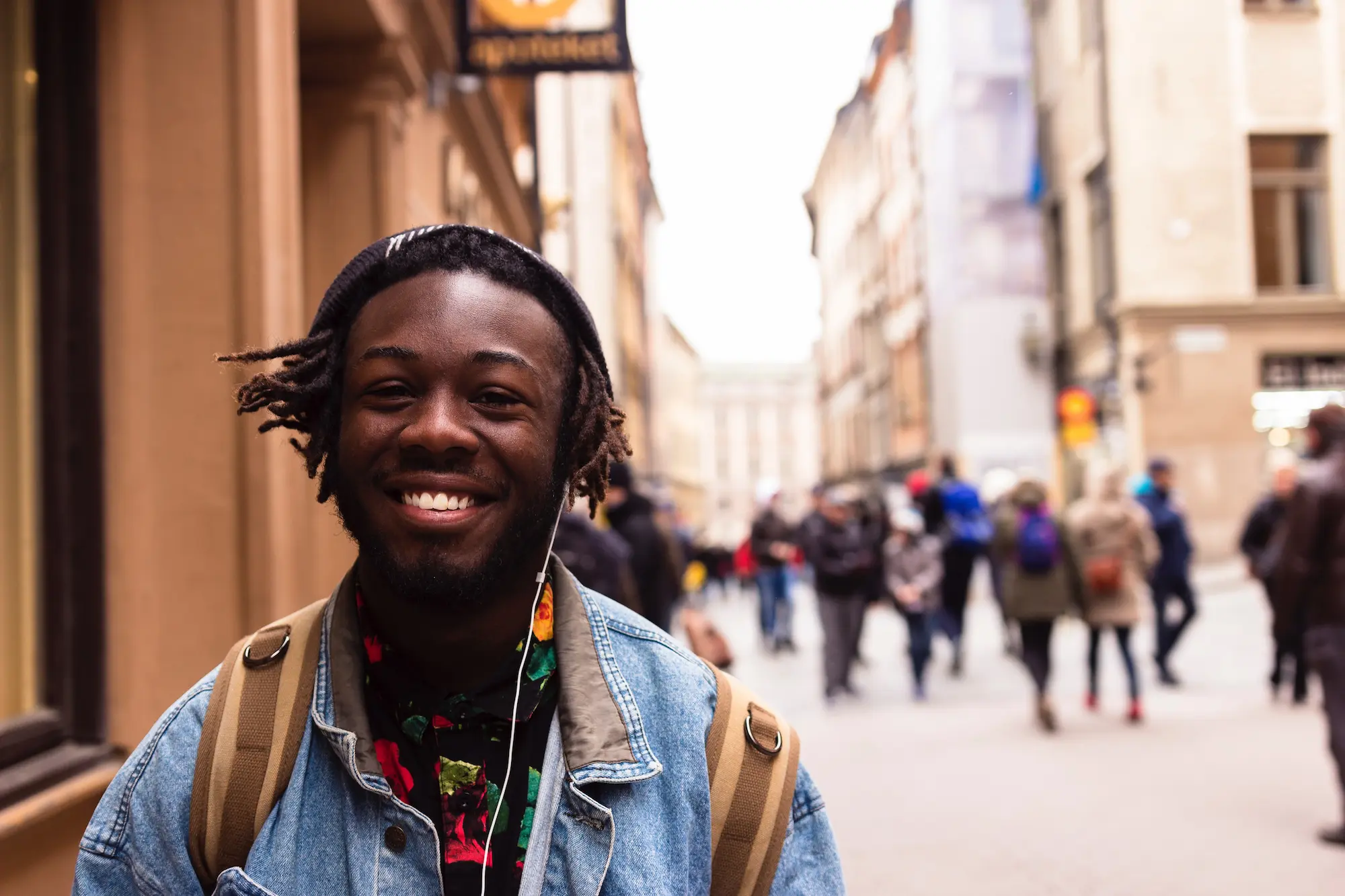 Young man walking through the city